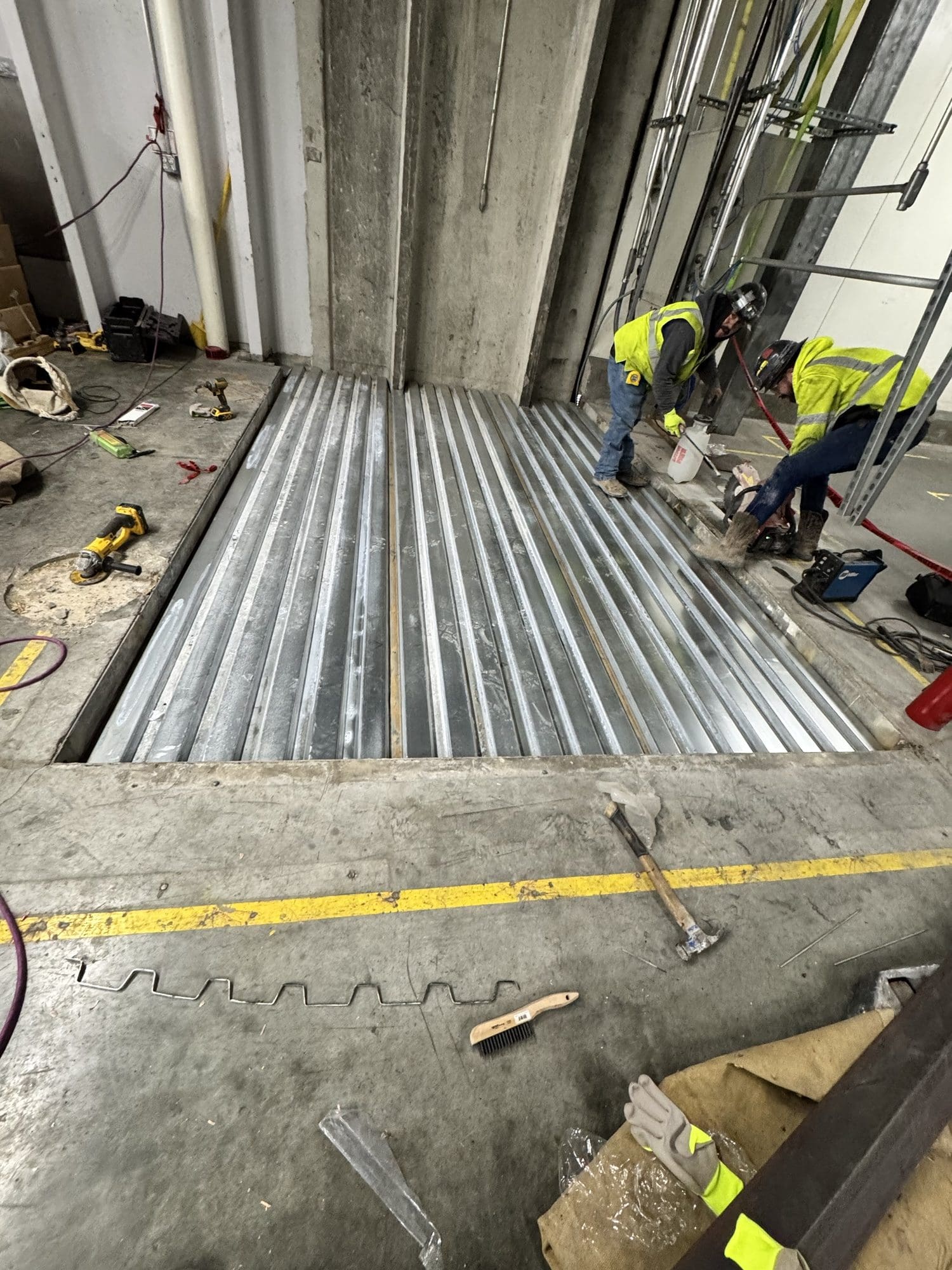 Midland crew erecting structural steel on a construction site